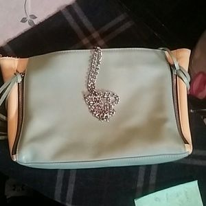 Like green / yellow "posse" brand over the shoulde